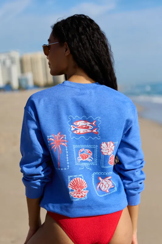 Coastal Stamps Blue Graphic Sweatshirt made by Pink Lily