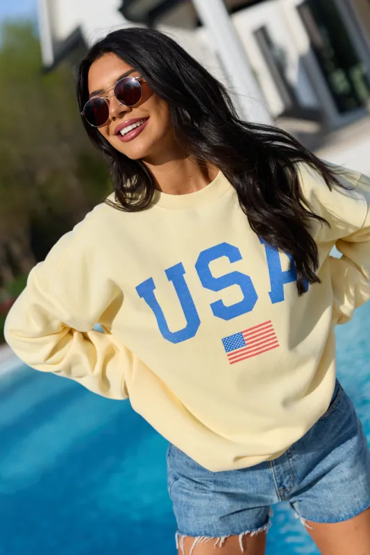 Athletic USA Flag Yellow Graphic Sweatshirt made by Pink Lily