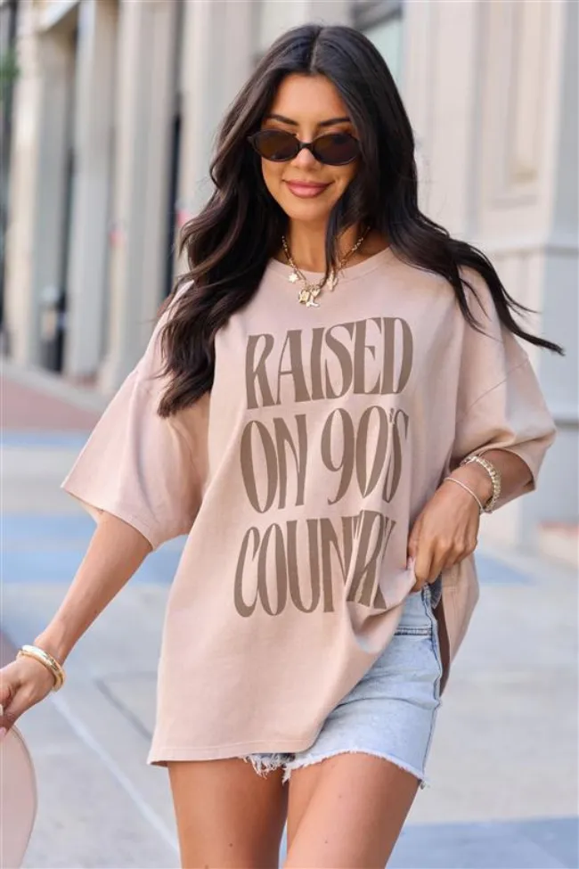 Raised On 90's Country Taupe Oversized Graphic Tee sold by Pink Lily