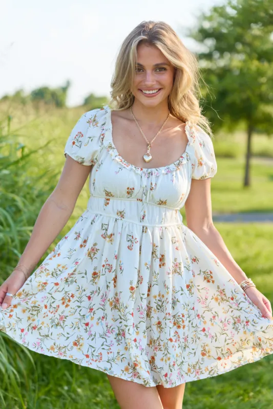 Sunlit Garden Ivory Multi Floral Puff Sleeve Mini Dress made by Blu Pepper
