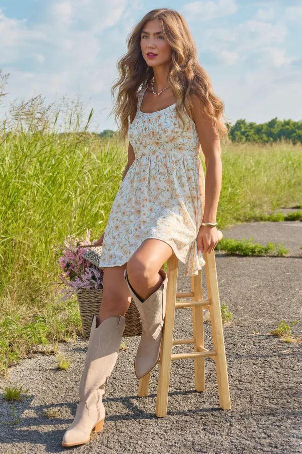 Golden Glow Ivory Floral Mini Dress sold by Pink Lily