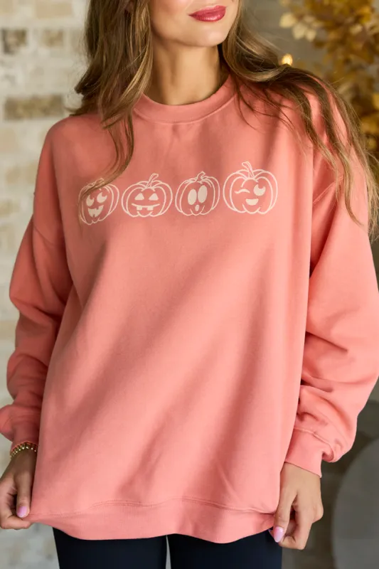 Pumpkin Faces Light Rust Graphic Sweatshirt made by Pink Lily