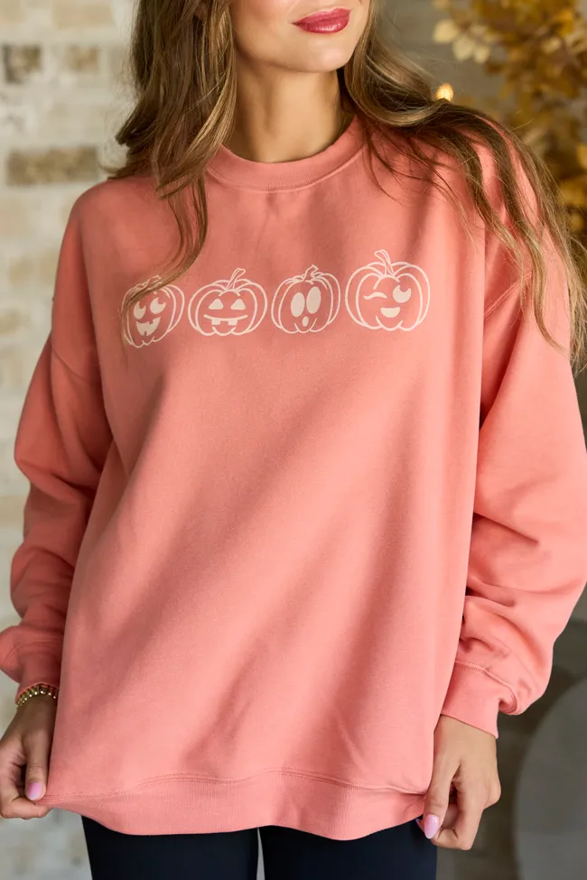 Pumpkin Faces Light Rust Graphic Sweatshirt sold by Pink Lily