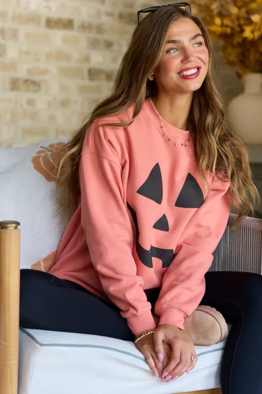 Pumpkin Face Light Rust Oversized Graphic Sweatshirt SALE made by Pink Lily