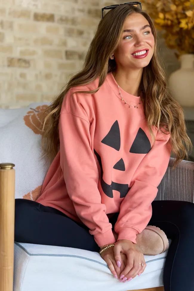 Pumpkin Face Light Rust Oversized Graphic Sweatshirt sold by Pink Lily