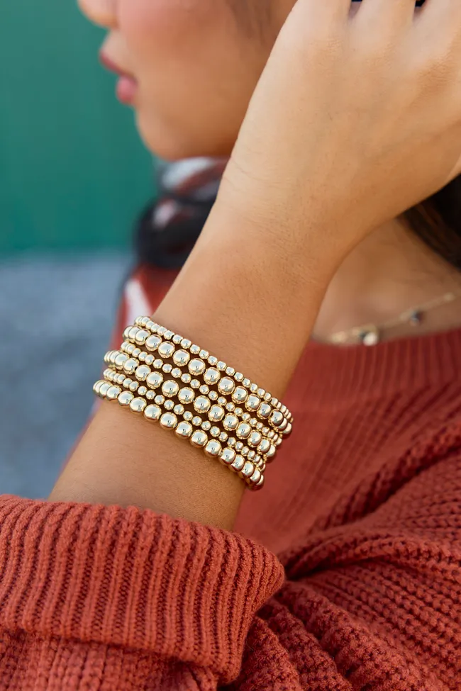 The Golden Stack Beaded Bracelet Set sold by Pink Lily