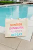Woven "Sunrise, Sunburn, Sunset, Repeat" Beach Bag sold by Pink Lily