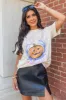 Spooky Vibes Cream Oversized Graphic Tee sold by Pink Lily