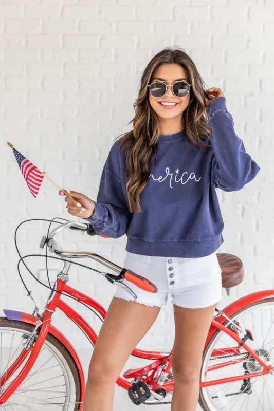 America Cursive Navy Cropped Corded Graphic Sweatshirt FINAL SALE made by Pink Lily