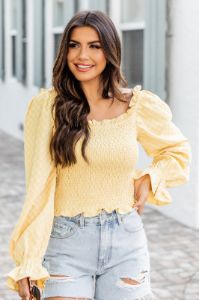 Trying Not To Call Smocked Yellow Blouse sold by Pink Lily