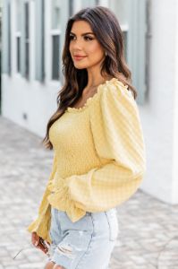 Trying Not To Call Smocked Yellow Blouse sold by Pink Lily