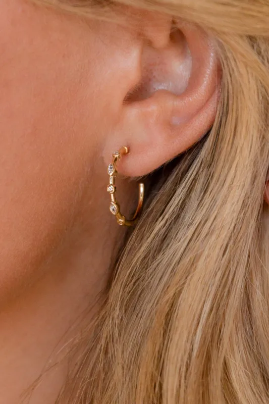 Gold Hoops sold by Pink Lily