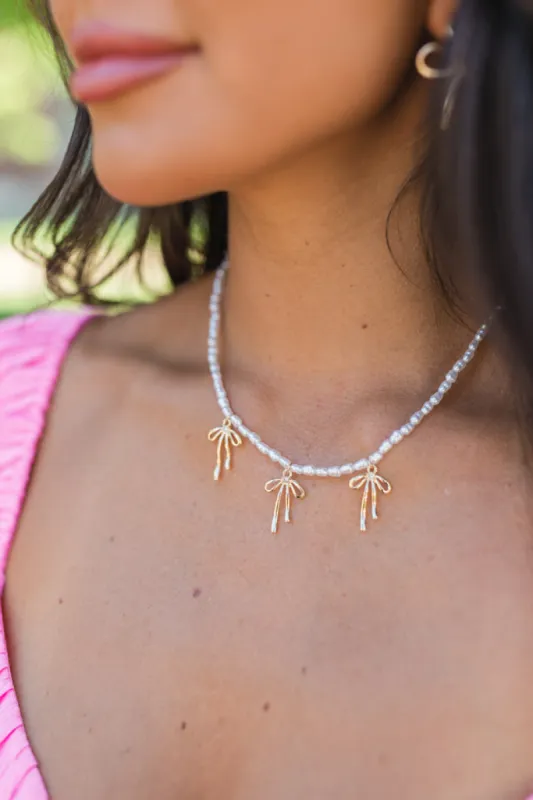 Pearl And Bow Charm Necklace sold by Pink Lily