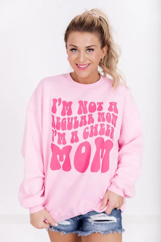 I'm Not A Regular Mom I'm A Cheer Mom Light Pink Oversized Graphic Sweatshirt sold by Pink Lily