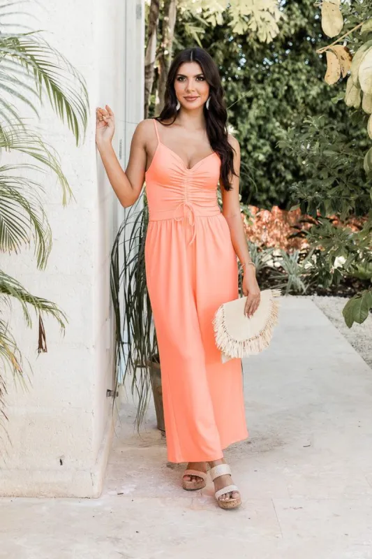 Somewhere Sunny Neon Coral Jumpsuit FINAL SALE sold by Pink Lily