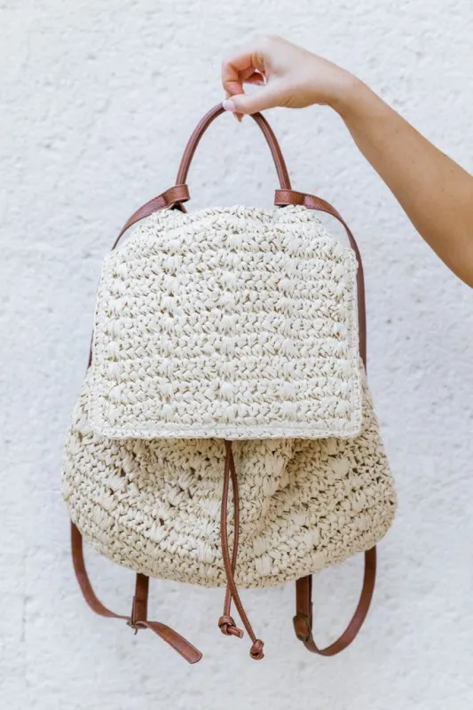 Just The Necessities Raffia Backpack sold by Pink Lily