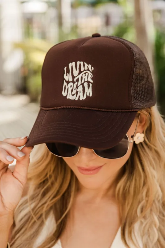 Living the Dream Brown Trucker Hat sold by Pink Lily