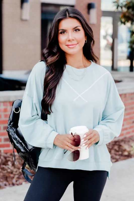 Making My Move Mint Exposed Seam Pullover sold by Pink Lily