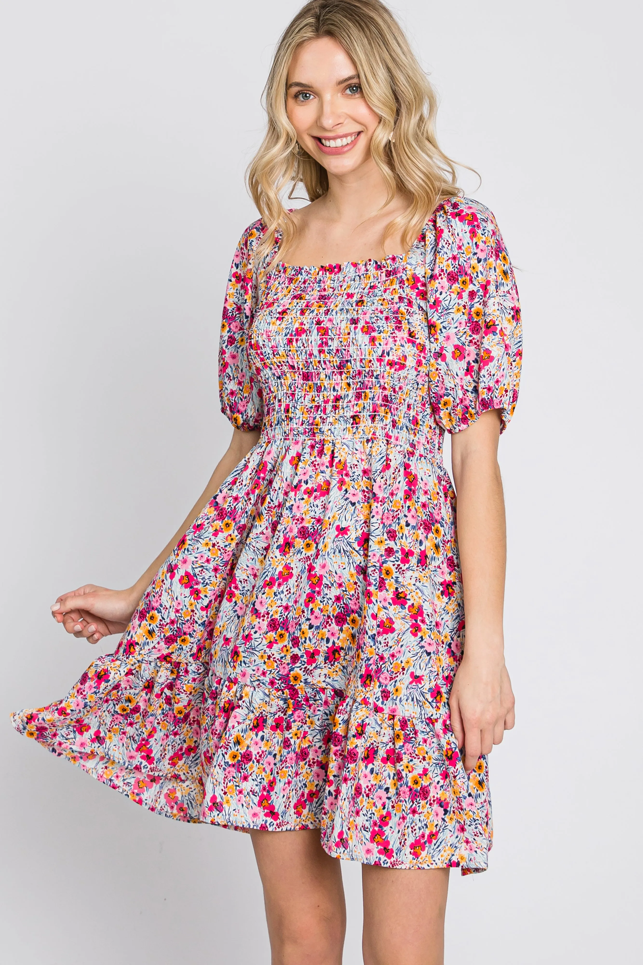 Fuchsia Floral Smocked Mini Dress sold by Pinkblush