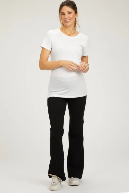 Black Flare Leg Fold Over Maternity Leggings sold by Pinkblush