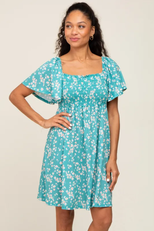 Teal Floral Smocked Dress sold by Pinkblush