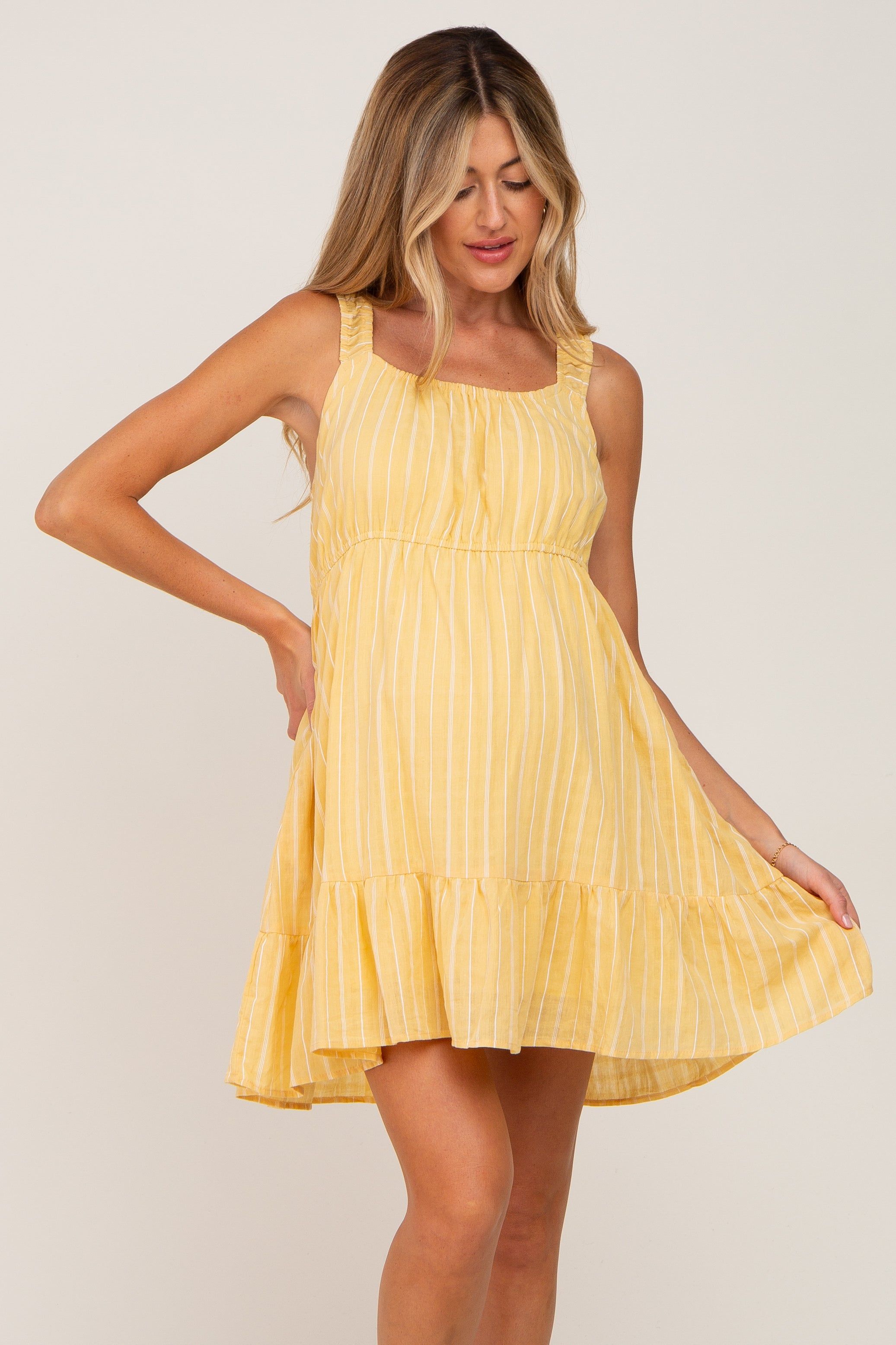 Yellow Striped Sleeveless Ruffle Maternity Dress sold by Pinkblush