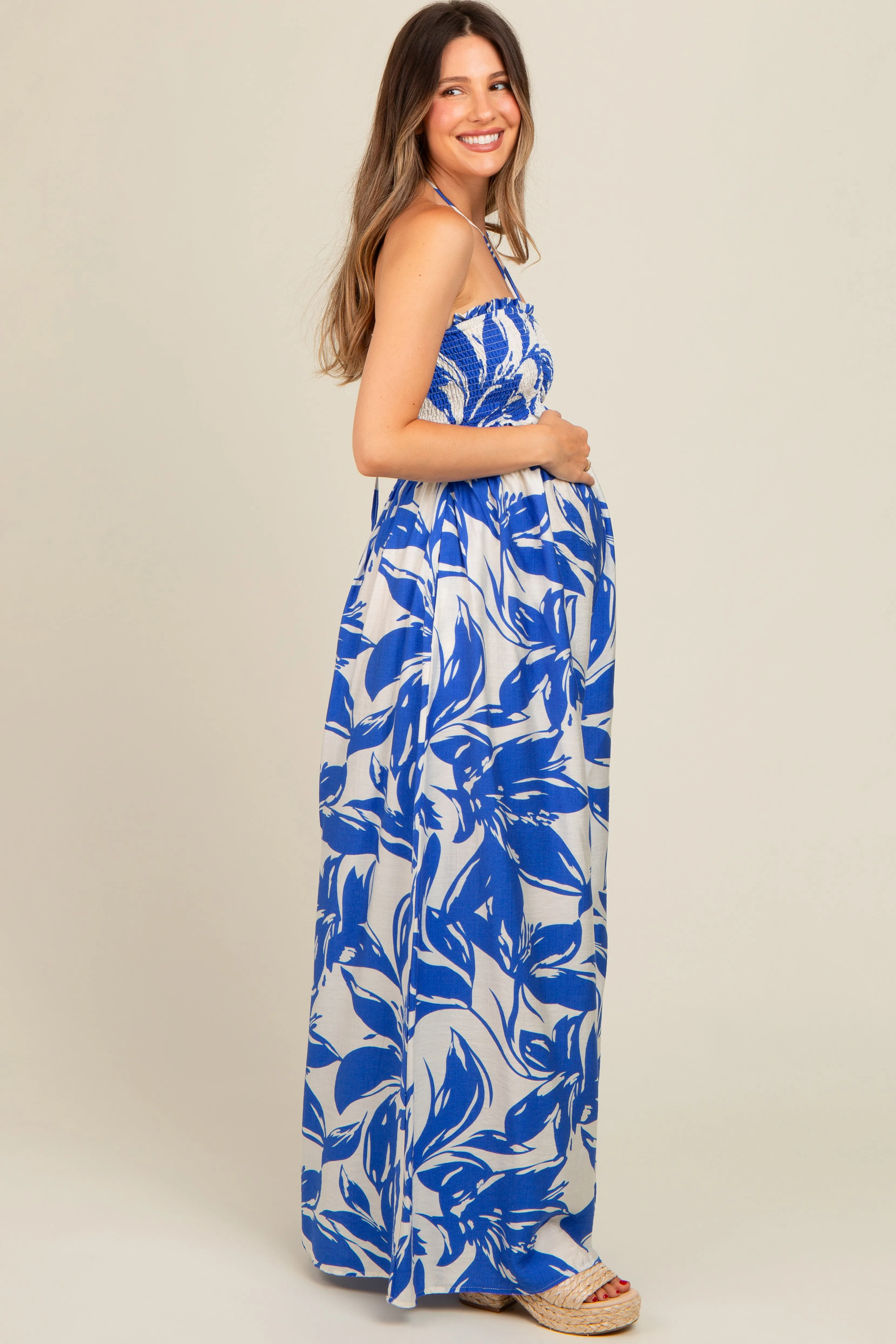 Royal Blue Tropical Print Cutout Smocked Maternity Jumpsuit sold by Pinkblush product image thumbnail 3