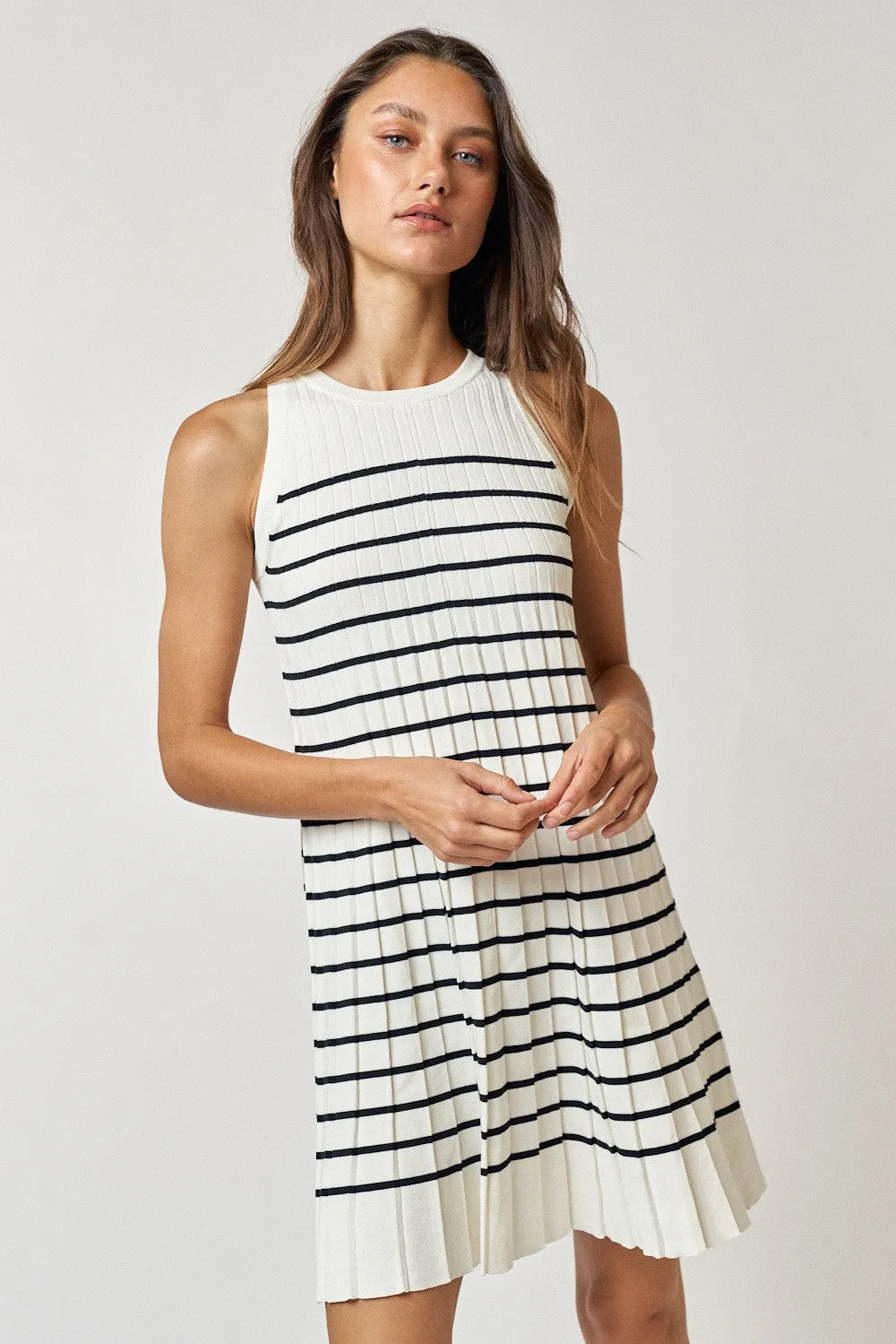 Cream Striped Sleeveless Pleated Mini Dress sold by Pinkblush