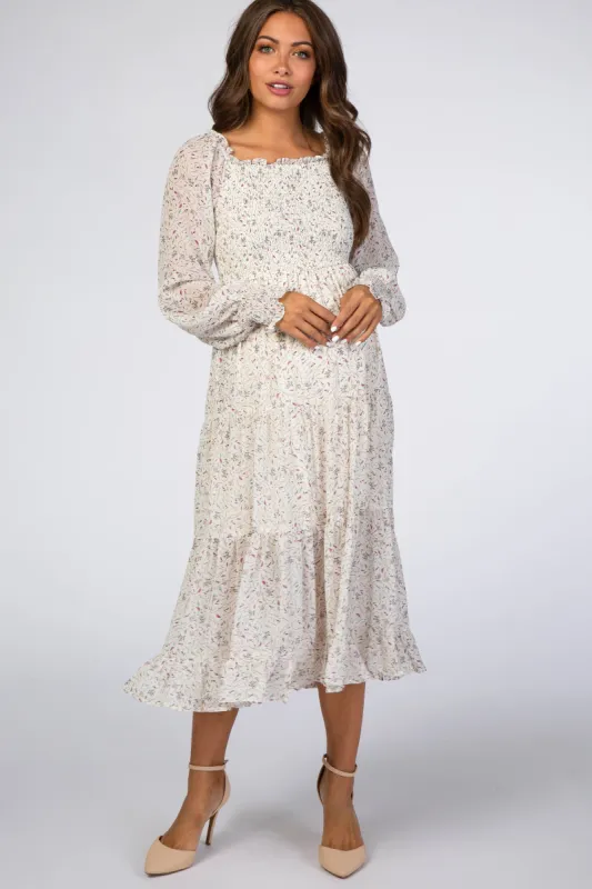 Ivory Floral Smocked Front Ruffle Hem Maternity Midi Dress sold by Pinkblush