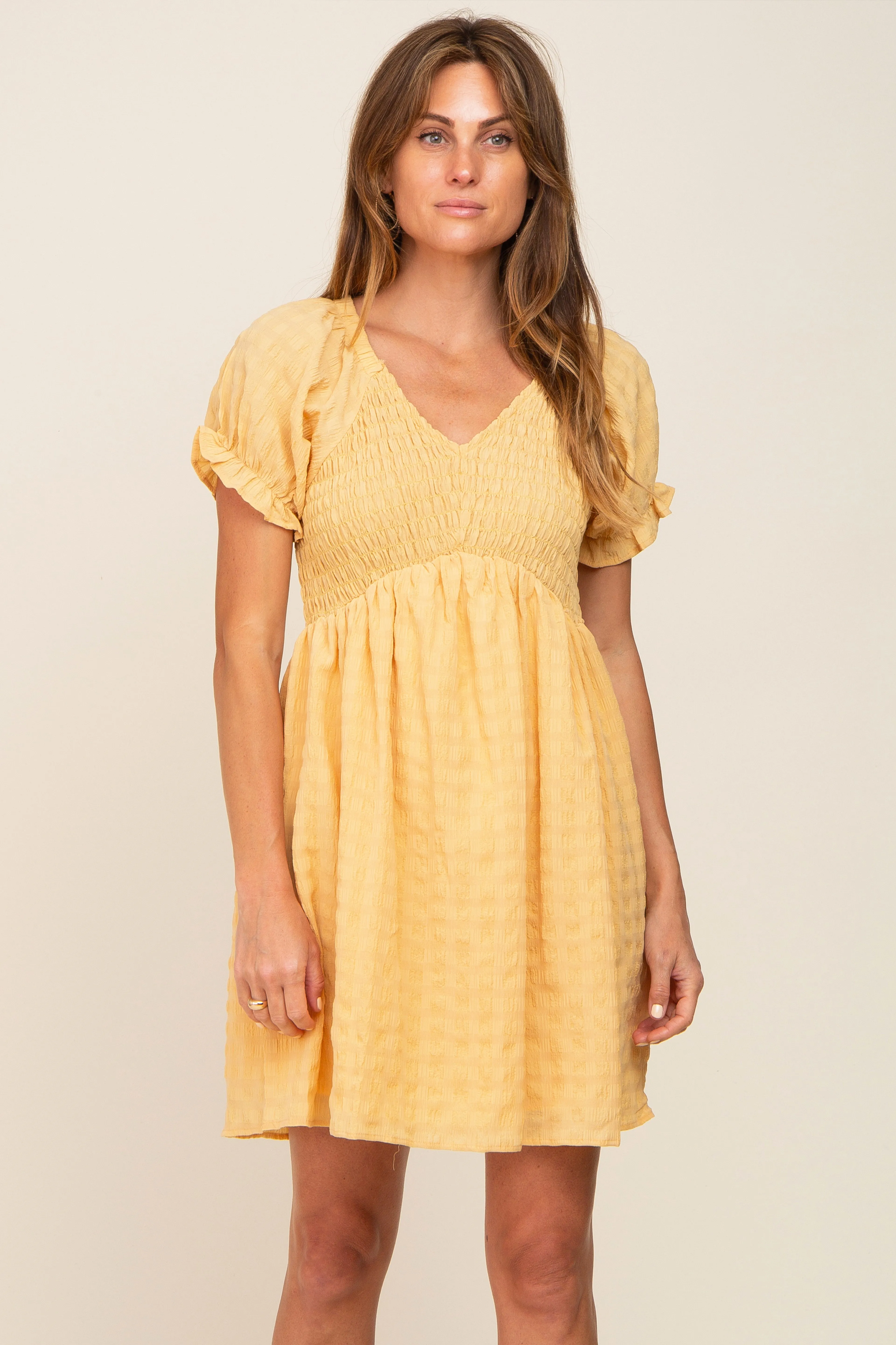 Yellow Smocked Textured V-Neck Dress sold by Pinkblush