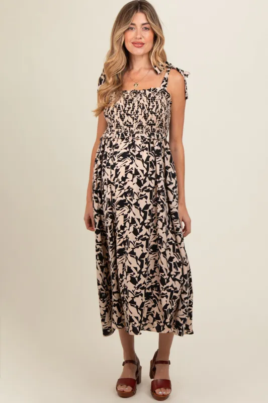 Black Printed Smocked Shoulder Tie Maternity Midi Dress sold by Pinkblush