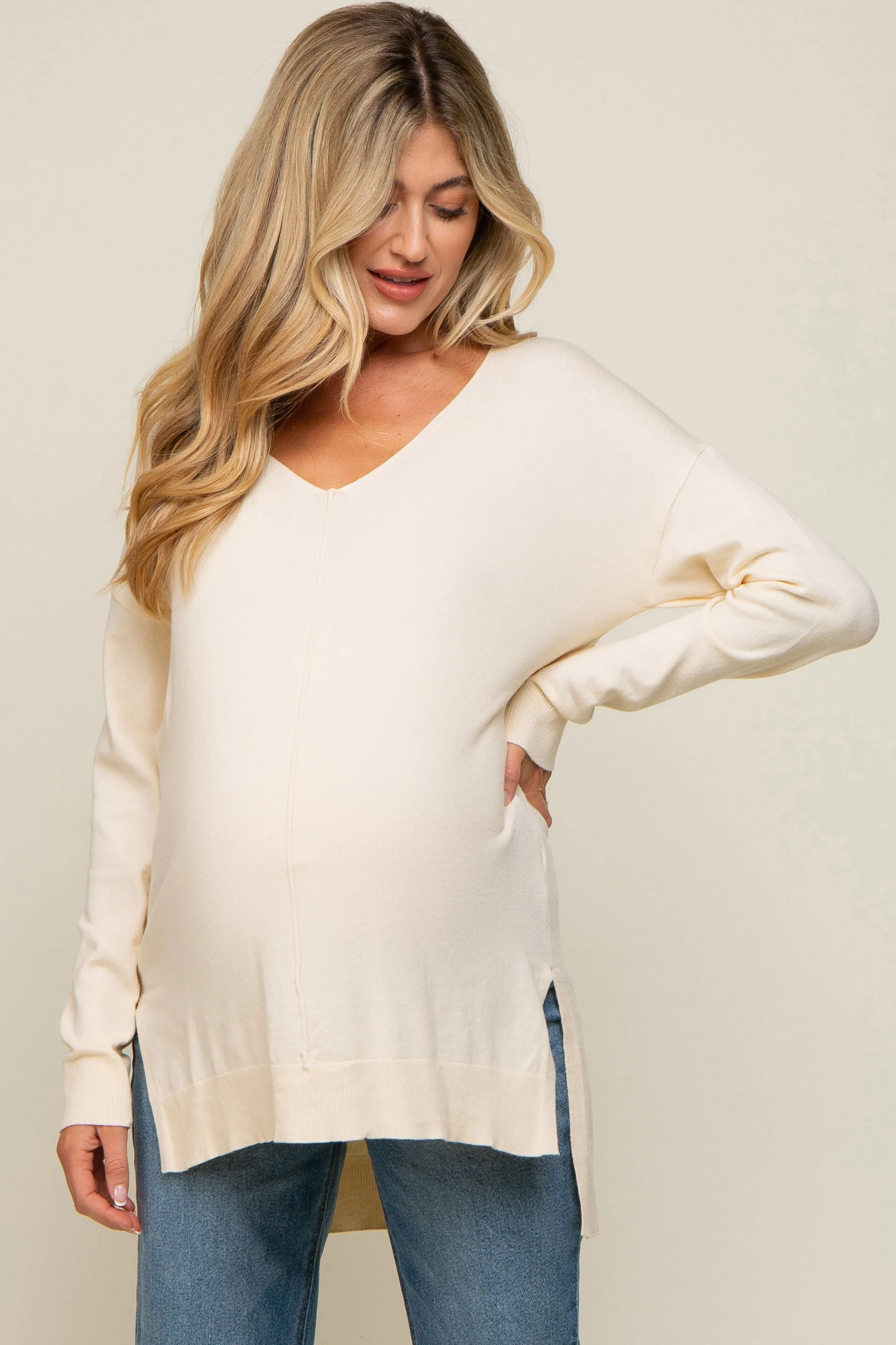 Cream Oversized Knit Side Slit Maternity Top sold by Pinkblush