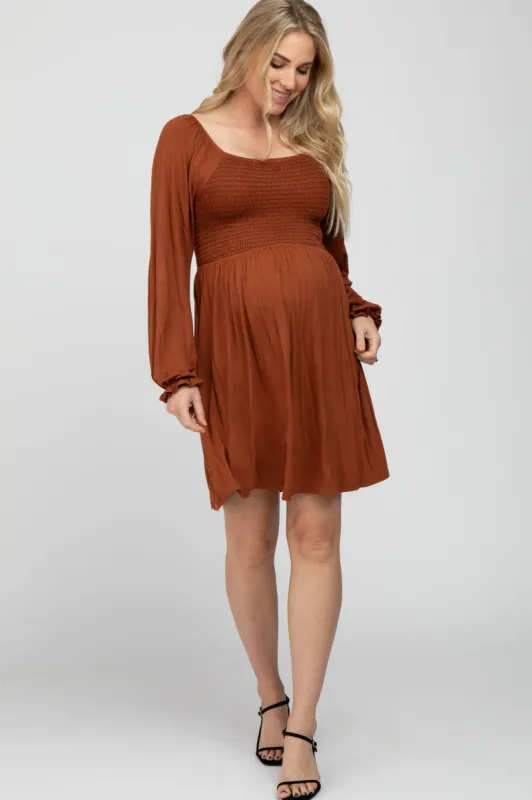 Rust Smocked Front Babydoll Maternity Dress sold by Pinkblush