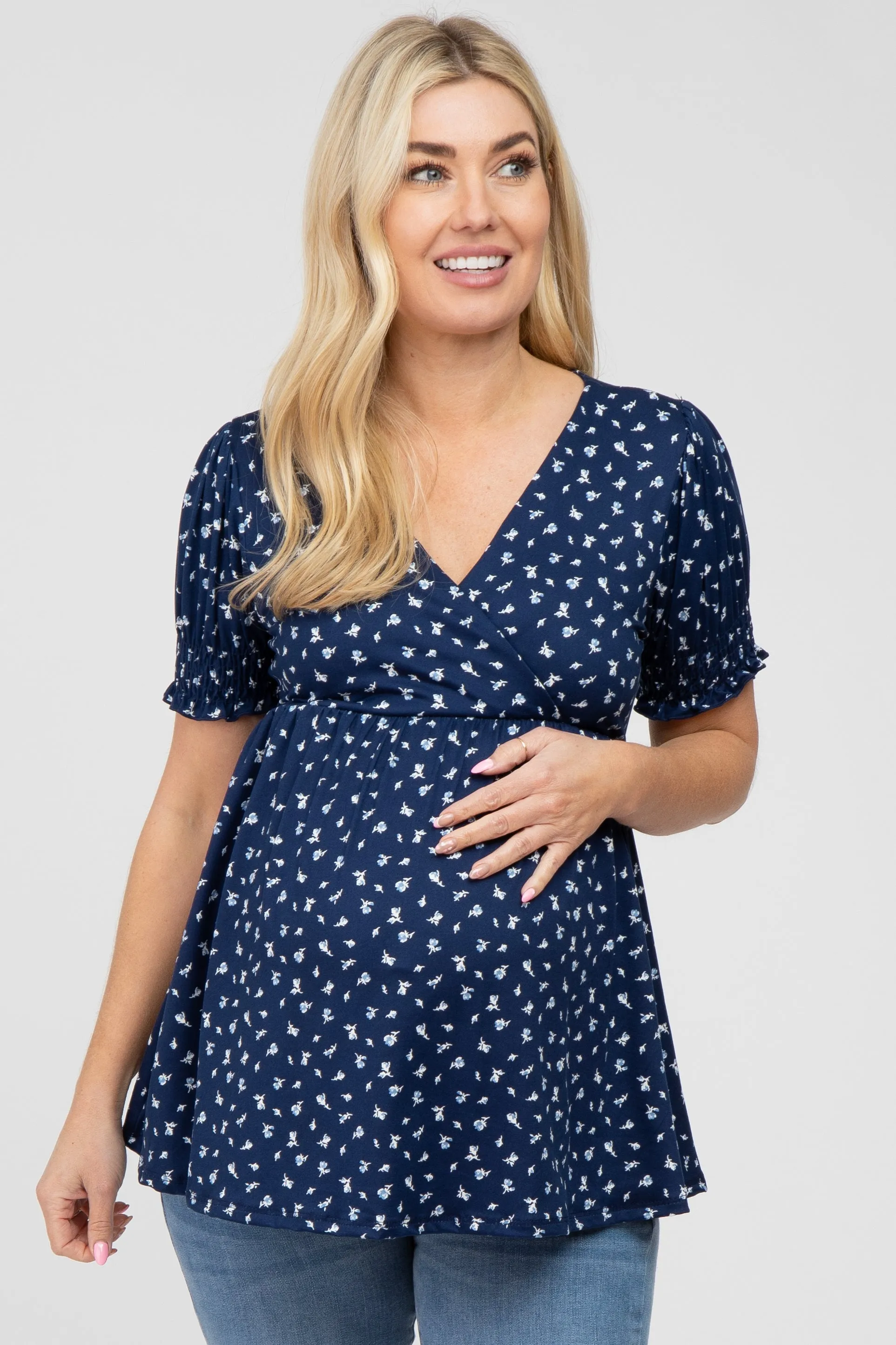 Navy Ditsy Floral Smocked Sleeve Maternity Wrap Top sold by Pinkblush