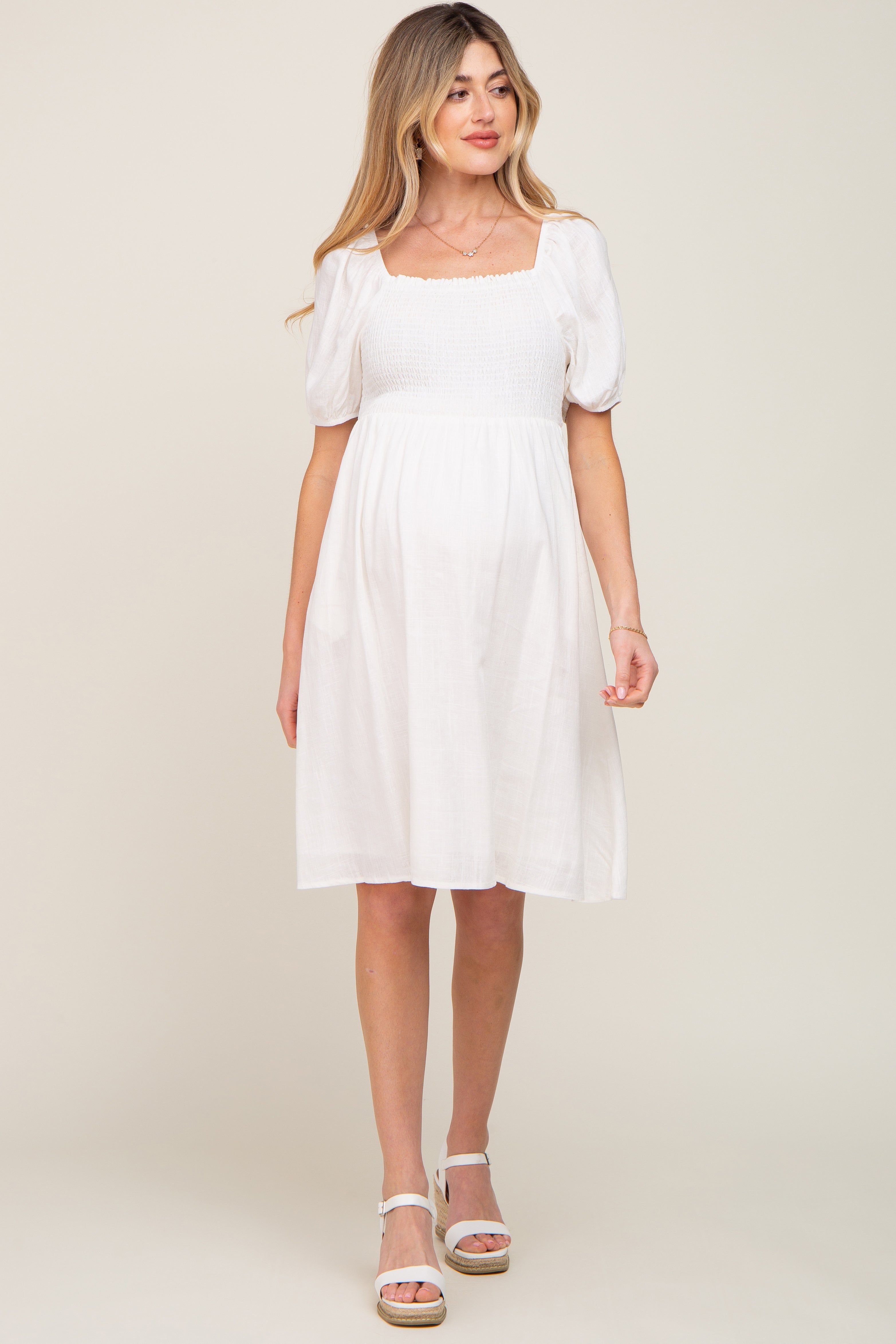 White Smocked Short Sleeve Linen Maternity Midi Dress sold by Pinkblush
