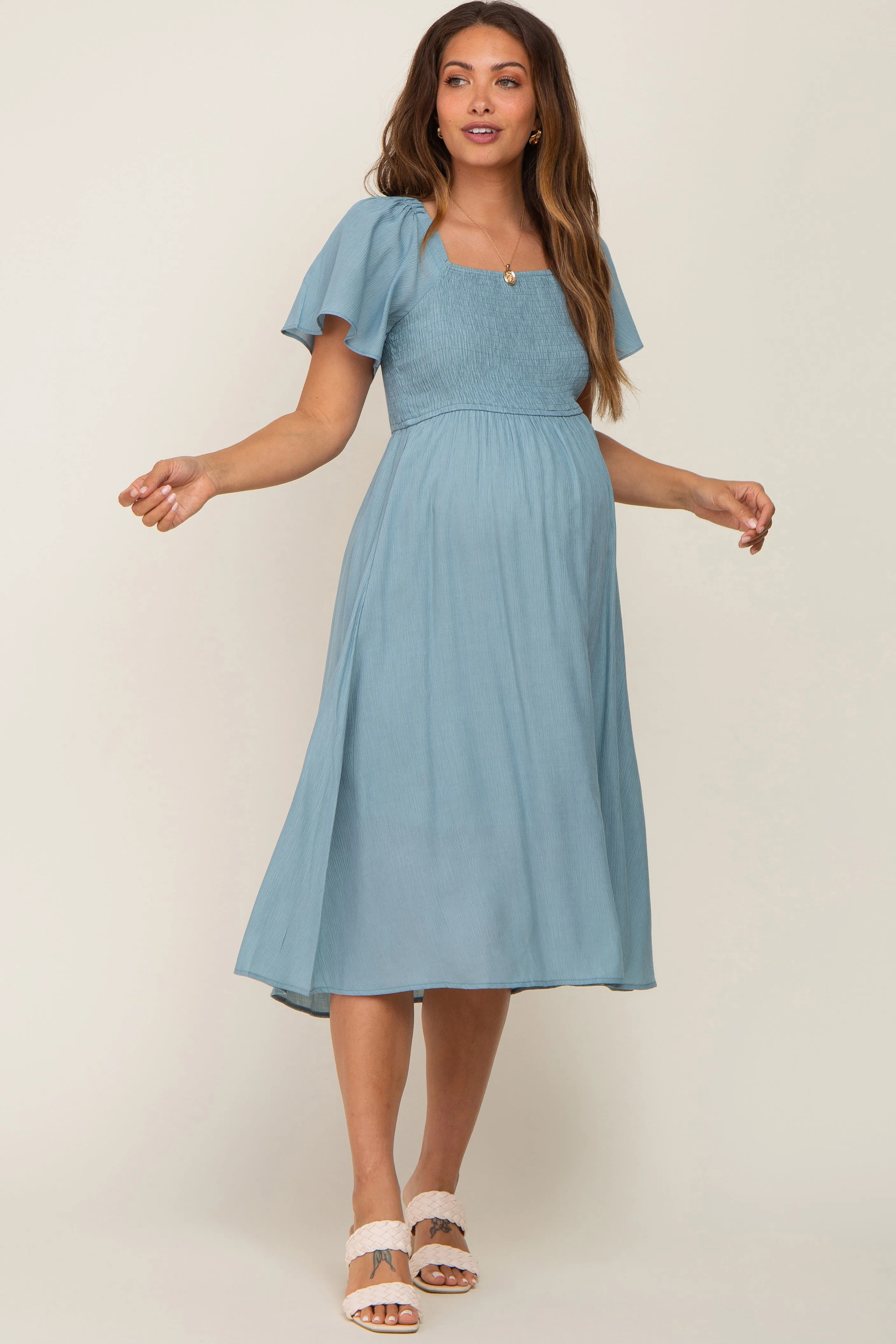 Light Blue Smocked Square Neck Flutter Short Sleeve Maternity Midi Dress sold by Pinkblush