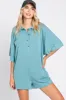 Teal Heathered Front Button Romper sold by Pinkblush