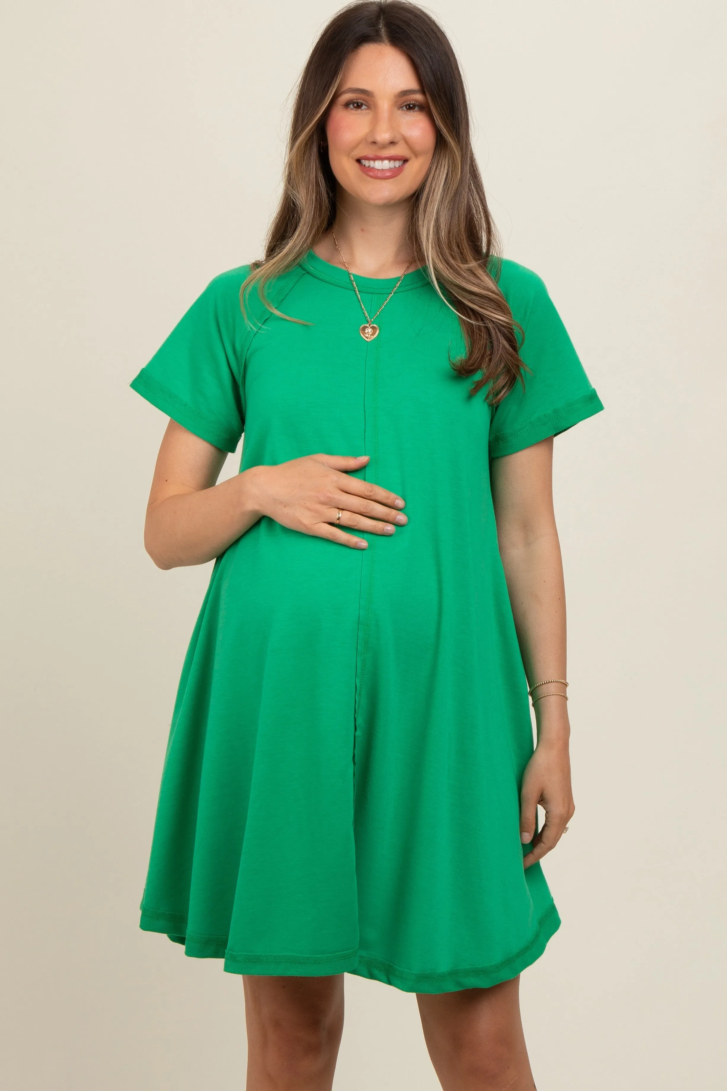 Green Solid T-shirt Maternity Mini Dress sold by Pinkblush