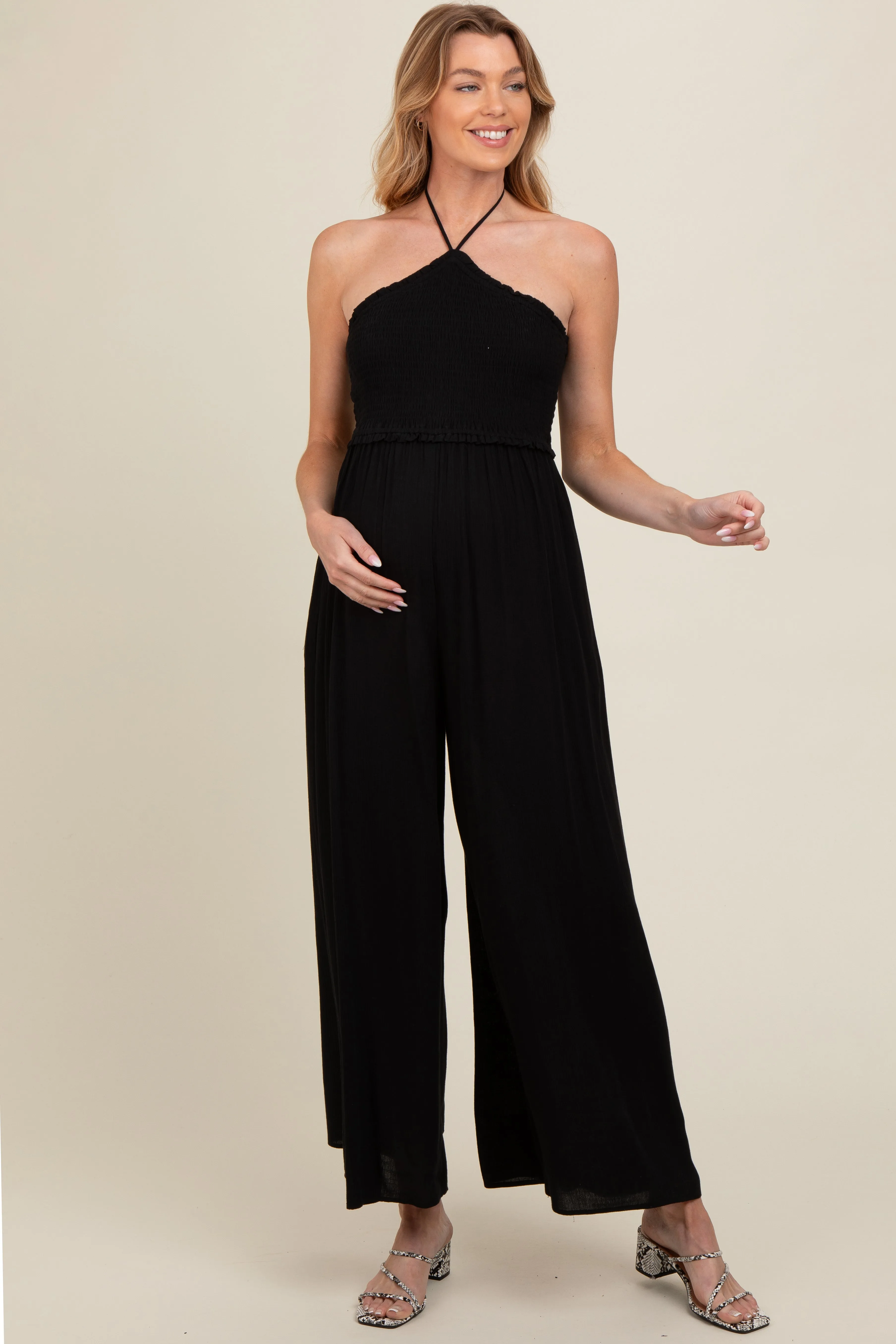 Black Back Cutout Smocked Halter Wide Leg Maternity Jumpsuit sold by Pinkblush product image thumbnail 2