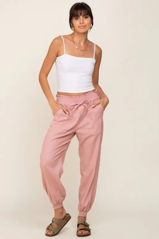 Mauve Smocked Joggers sold by Pinkblush