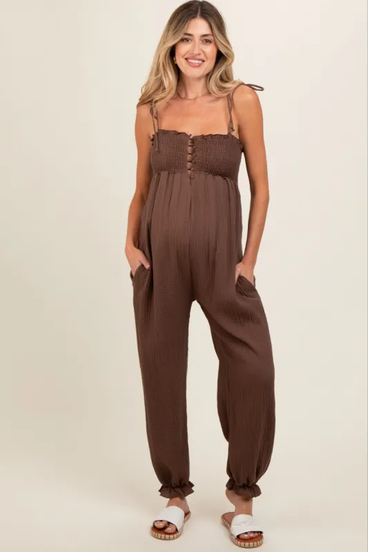 Brown Gauze Button Front Smocked Shoulder Tie Maternity Jumpsuit sold by Pinkblush
