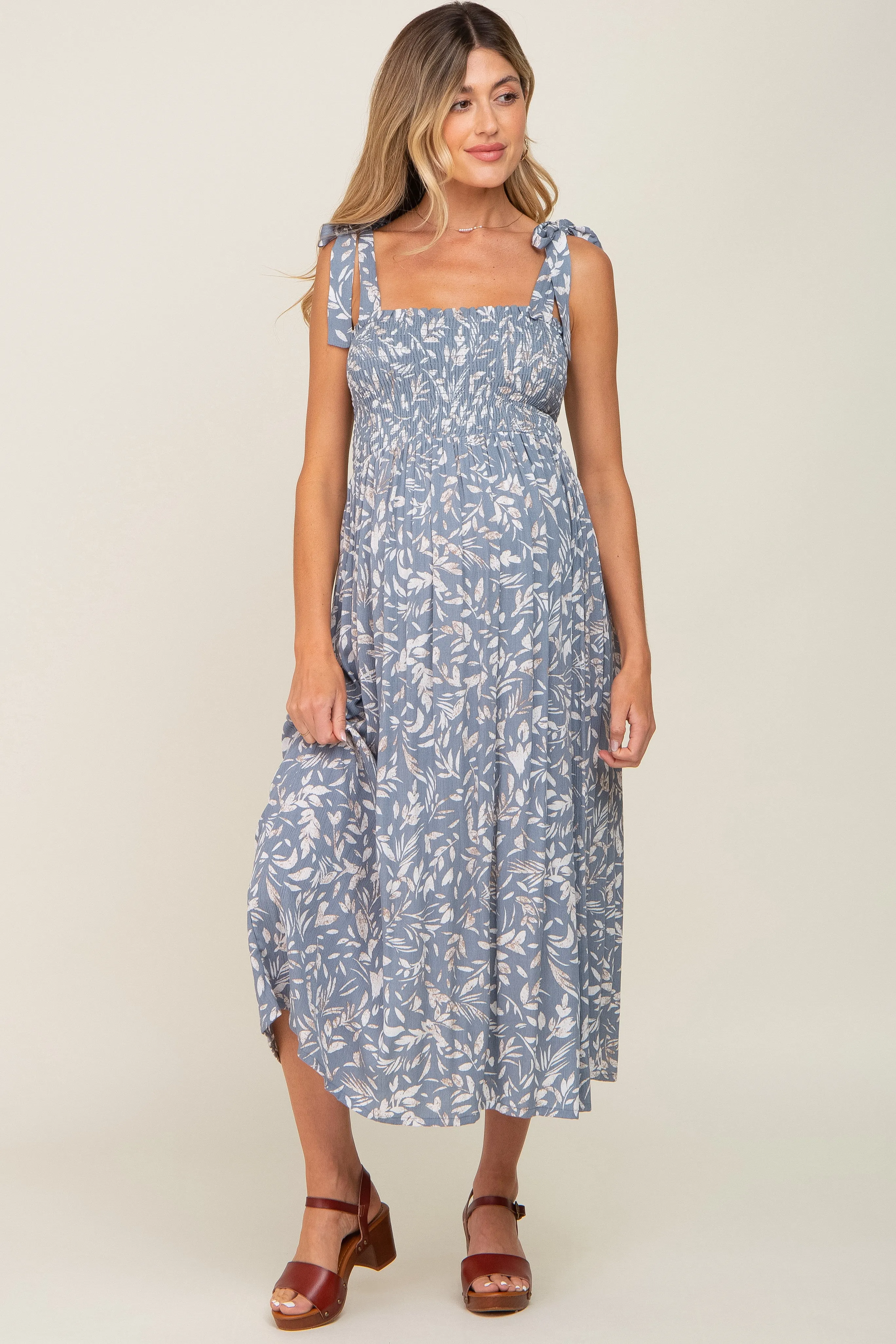 Light Blue Floral Smocked Shoulder Tie Maternity Midi Dress sold by Pinkblush