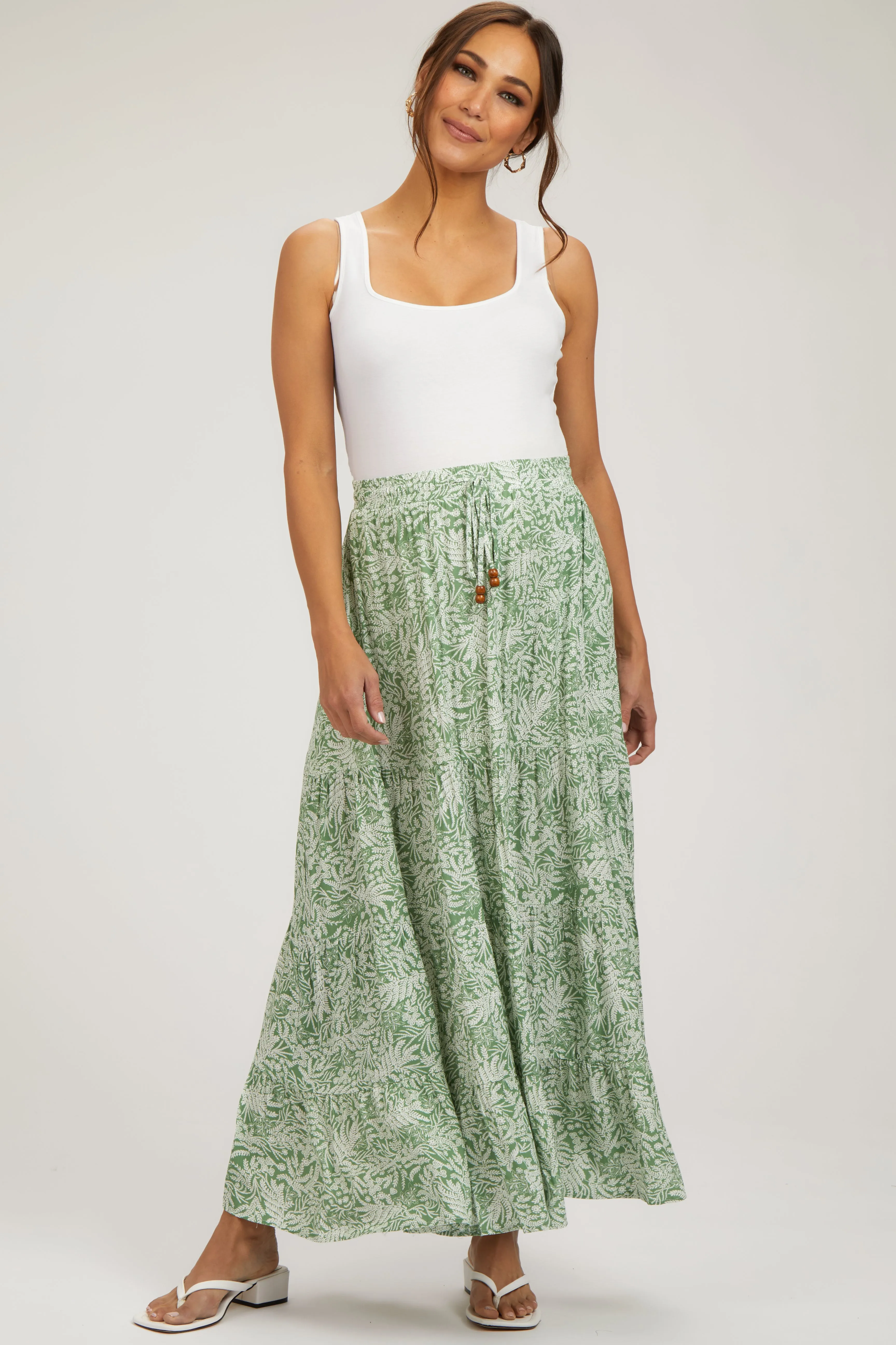 Light Olive Leaf Printed Drawstring Tiered Maternity Maxi Skirt sold by Pinkblush