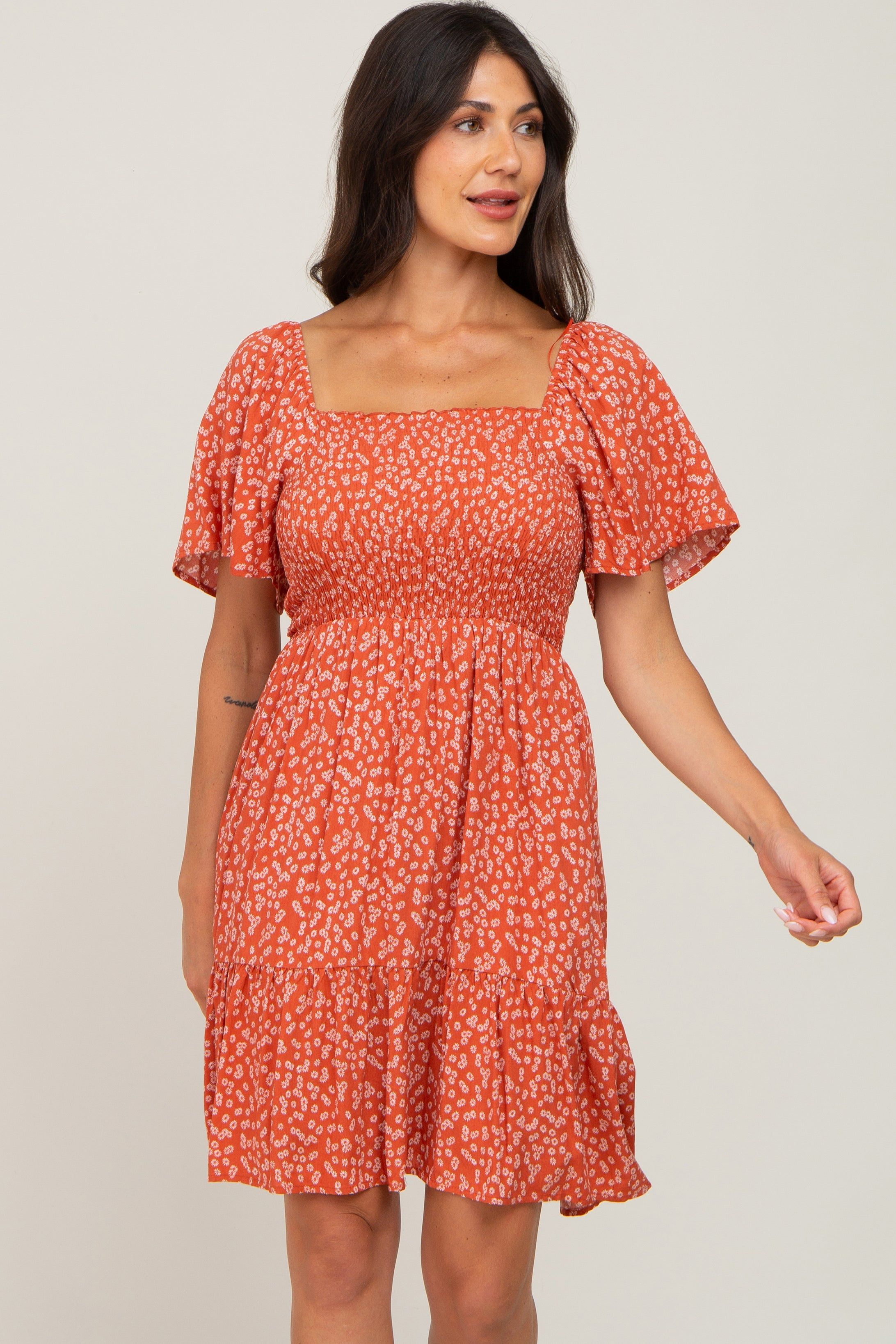 Coral Floral Smocked Dress sold by Pinkblush