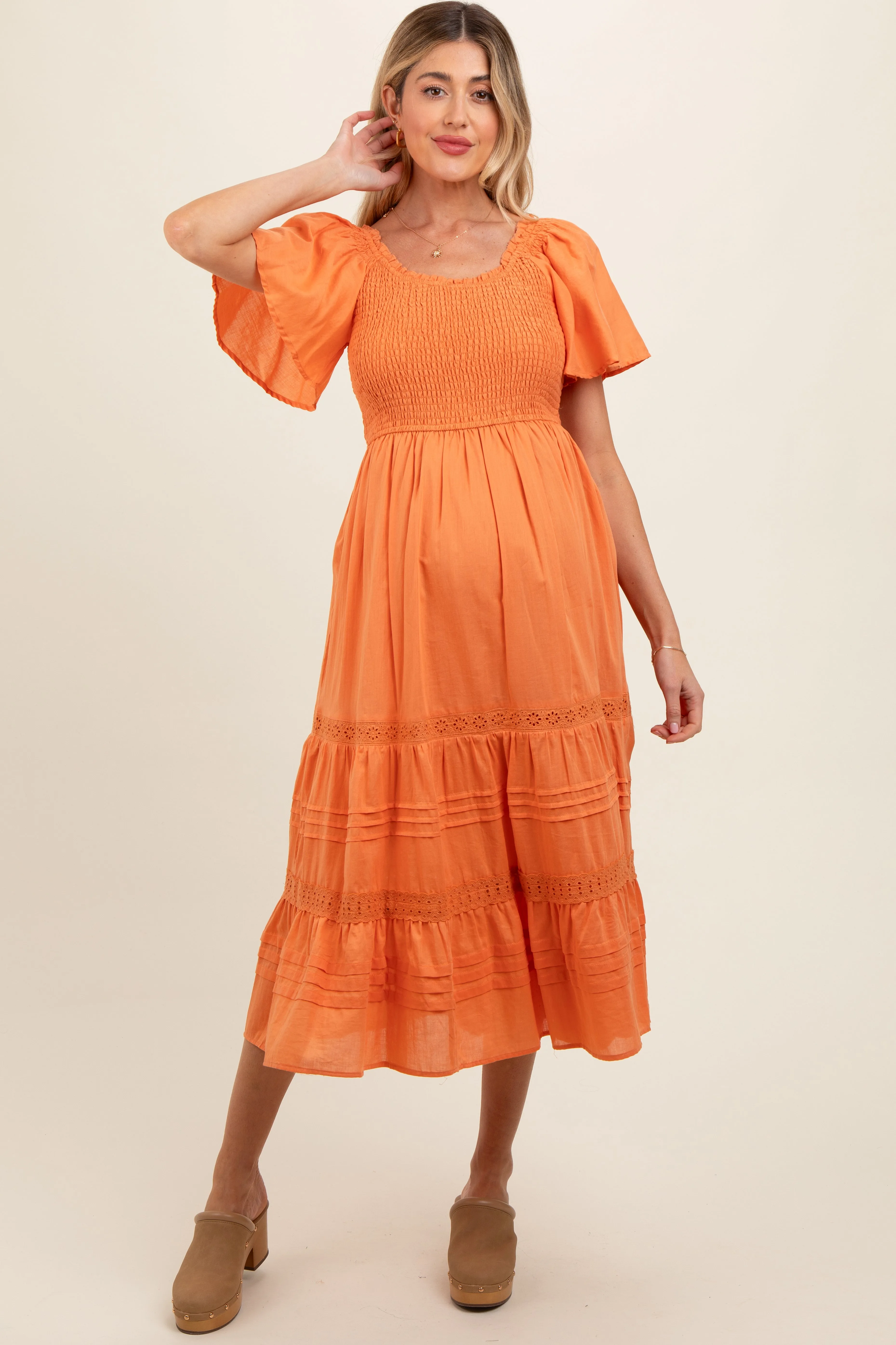Orange Smocked Short Sleeve Maternity Midi Dress sold by Pinkblush