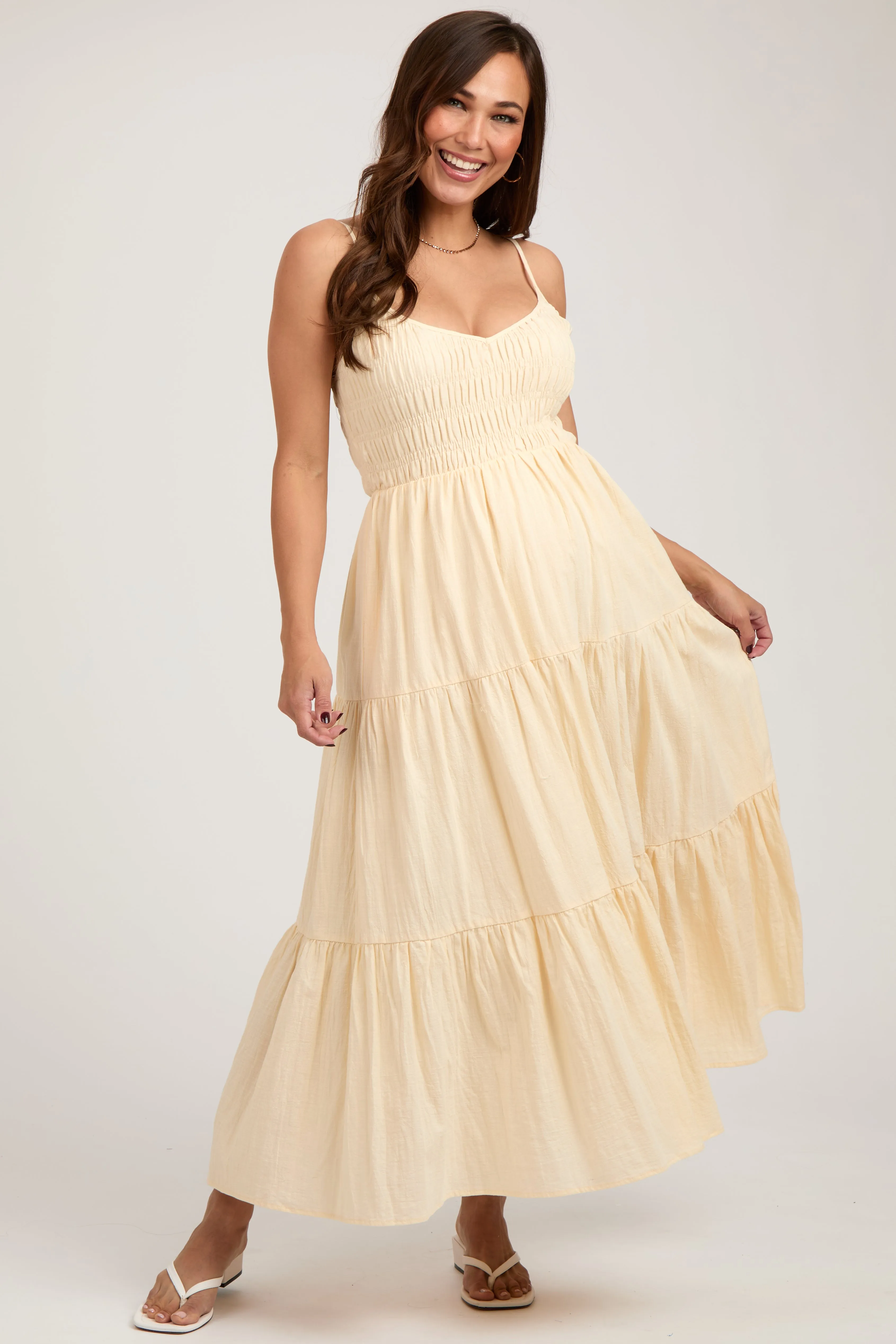 Cream Smocked V-Neck Sleeveless Tiered Maternity Midi Dress sold by Pinkblush