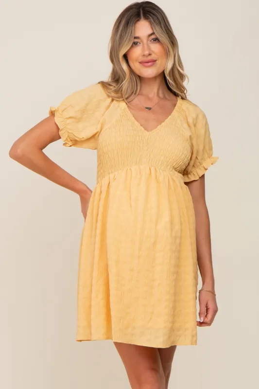 Yellow Smocked Textured V-Neck Maternity Dress sold by Pinkblush