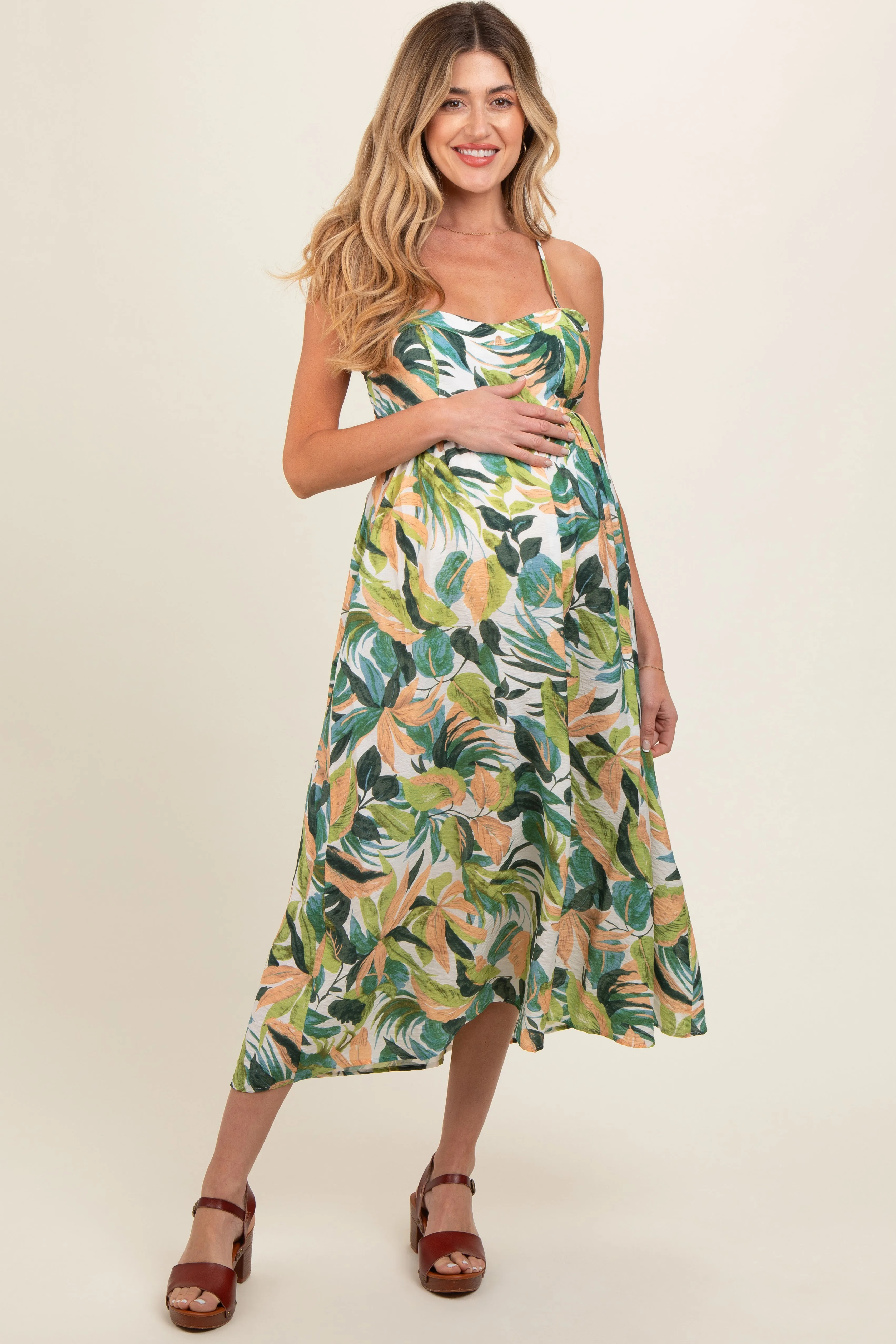 Green Leaf Print Open Back Maternity Midi Dress sold by Pinkblush