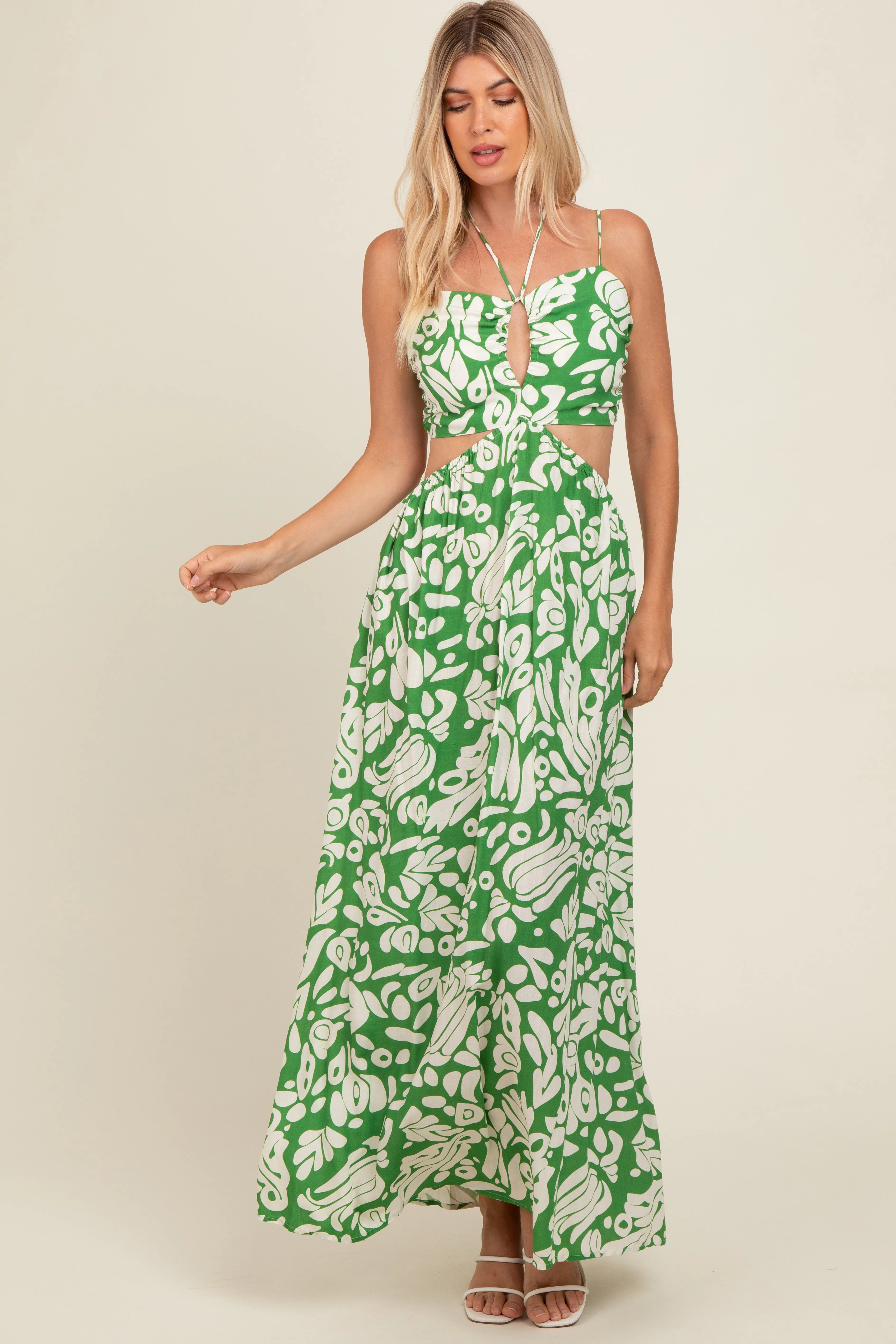 Green Printed Halter Cut-Out Maxi Dress sold by Pinkblush