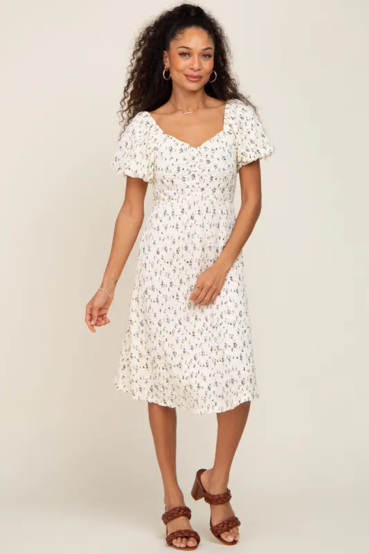 Ivory Smocked Floral Puff Sleeve Dress sold by Pinkblush